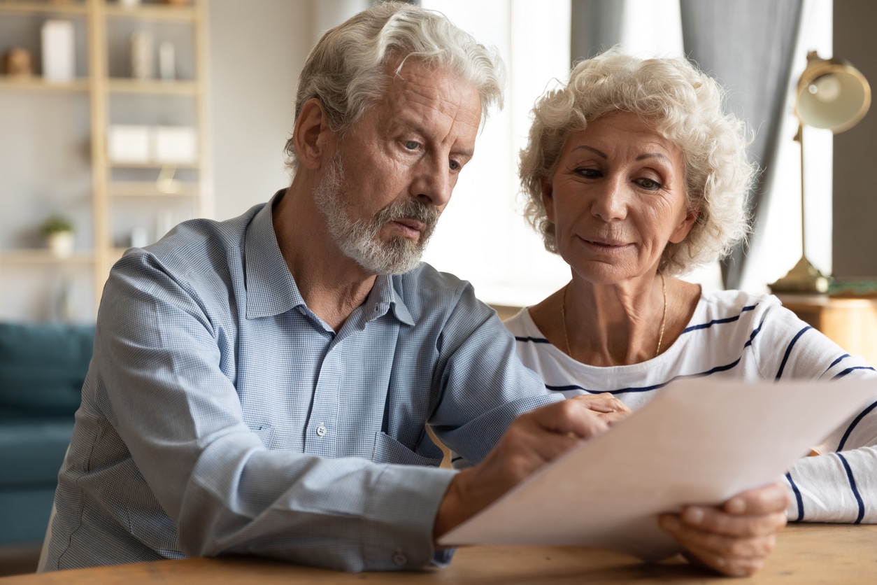 Man and women looking over documents