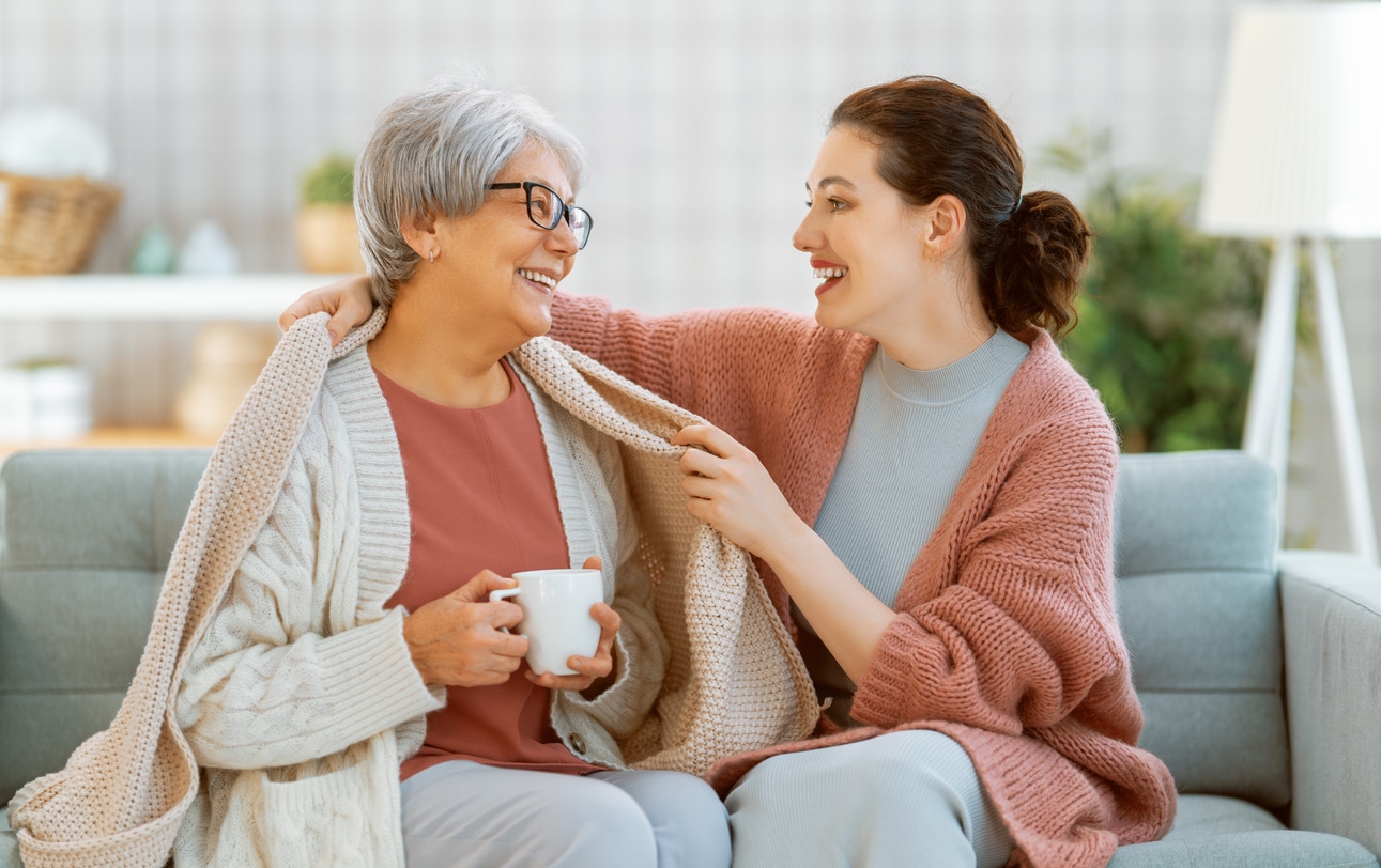 Mother and daughter on couch