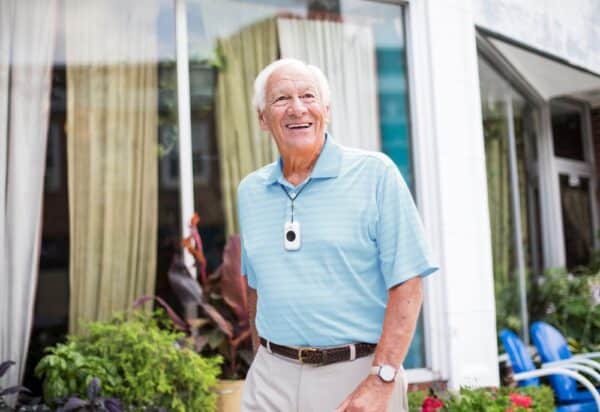 A senior man around town with his On the Go medical alert system.