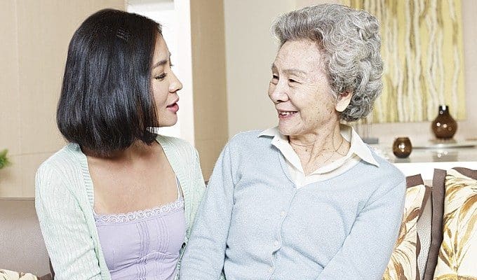 woman smiling at daughter