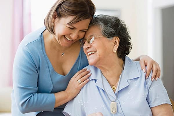 Mother and daughter laughing together