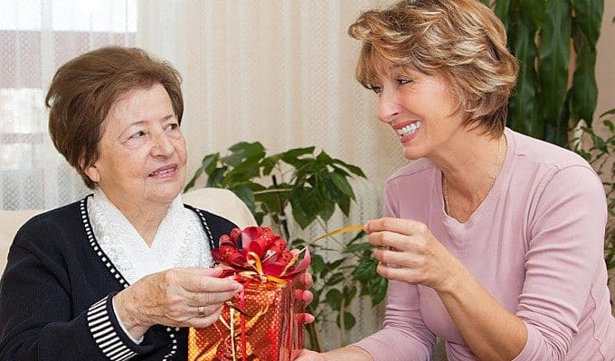 woman unwrapping present