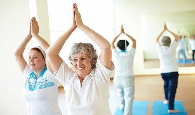 women doing yoga