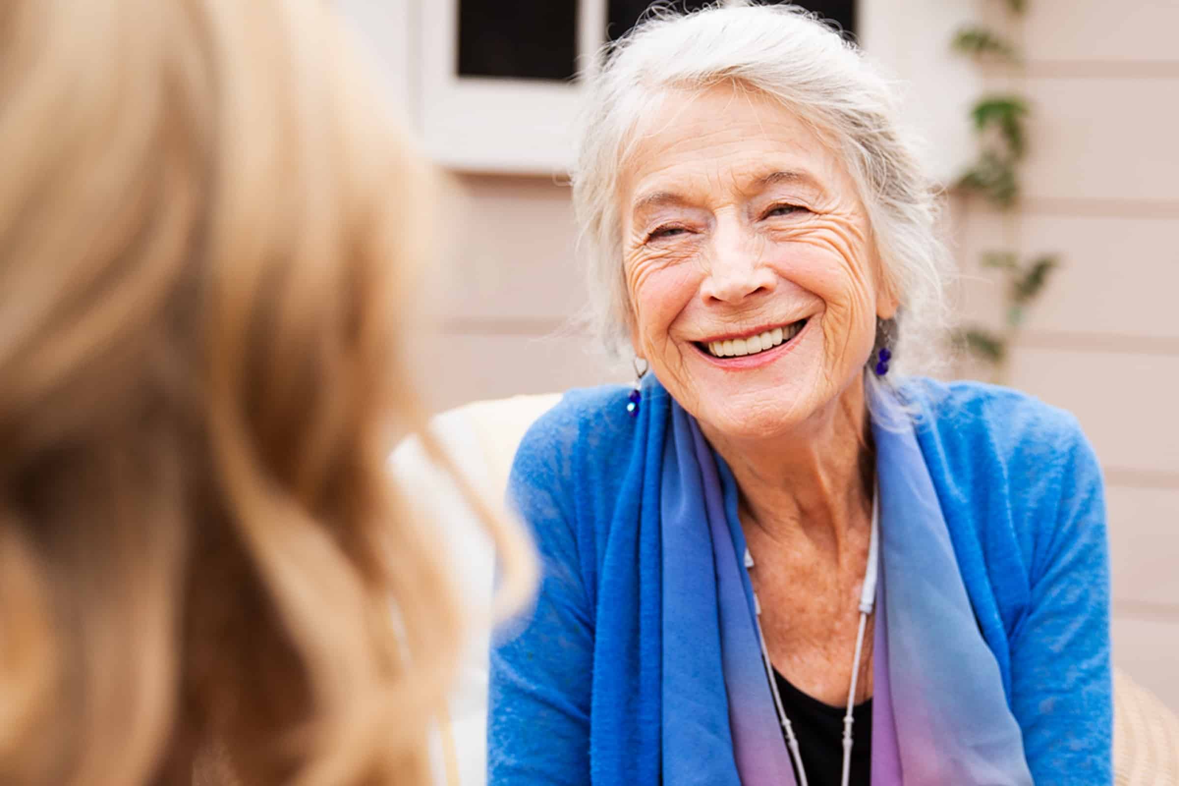 woman smiling at caregiver