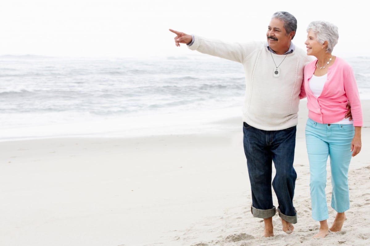 Couple Walking On Beach