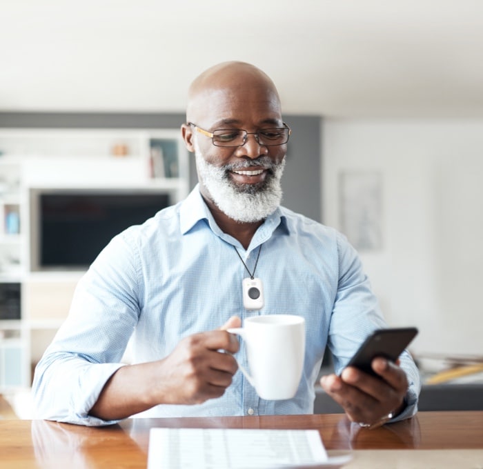 Man drinking coffee with On the Go