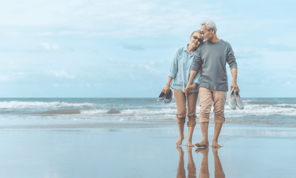 Couple walking on beach