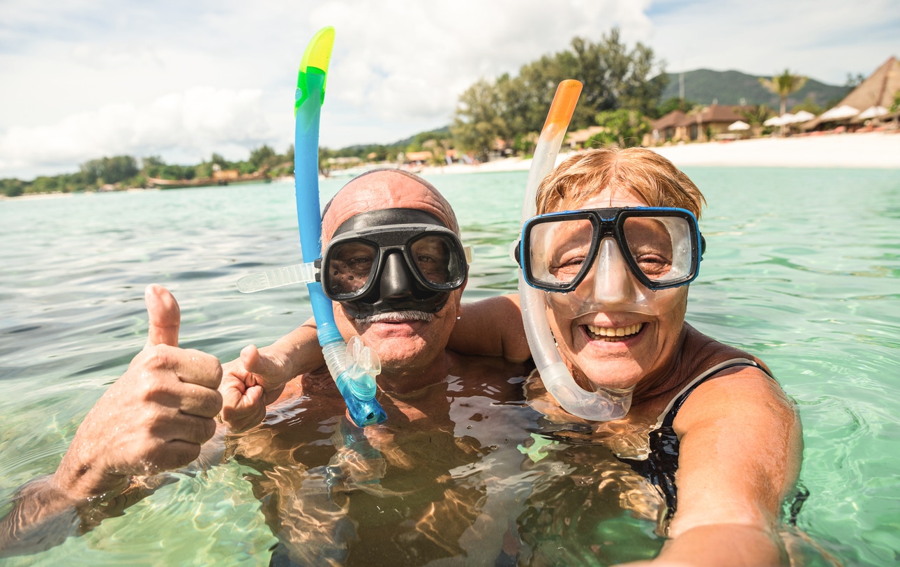 Senior couple swimming