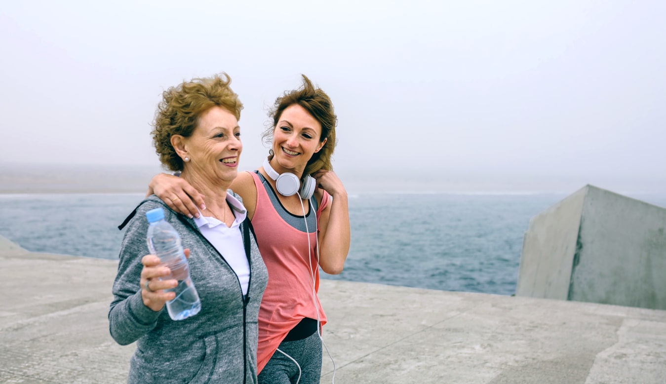 Women walking on boardwalk