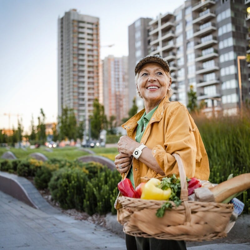woman at farmers market wearing mini pendant