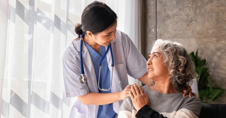 UTI symptoms in seniors discussed during a healthcare visit with an older woman