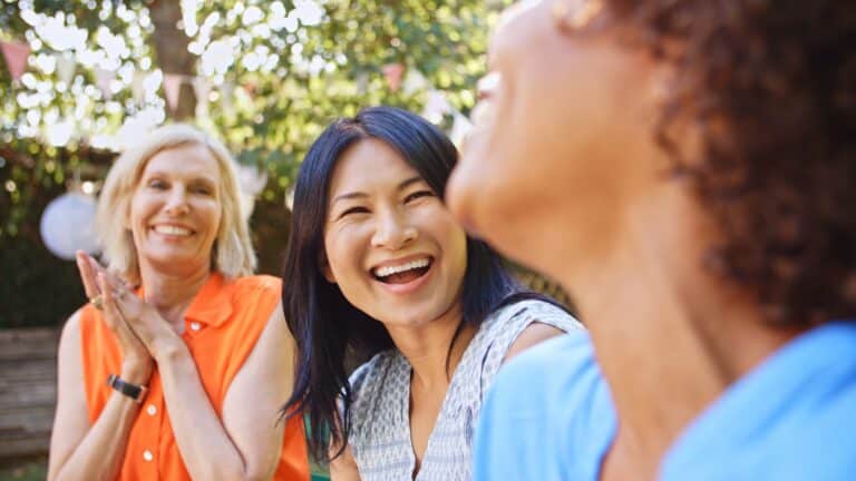Caregiver support group sharing a positive moment together